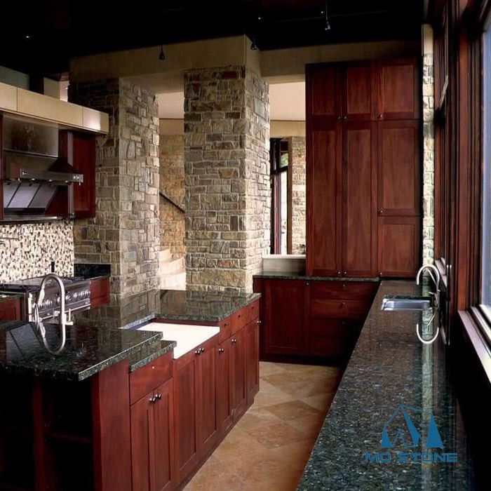 verde green granite countertops with brown cabinet