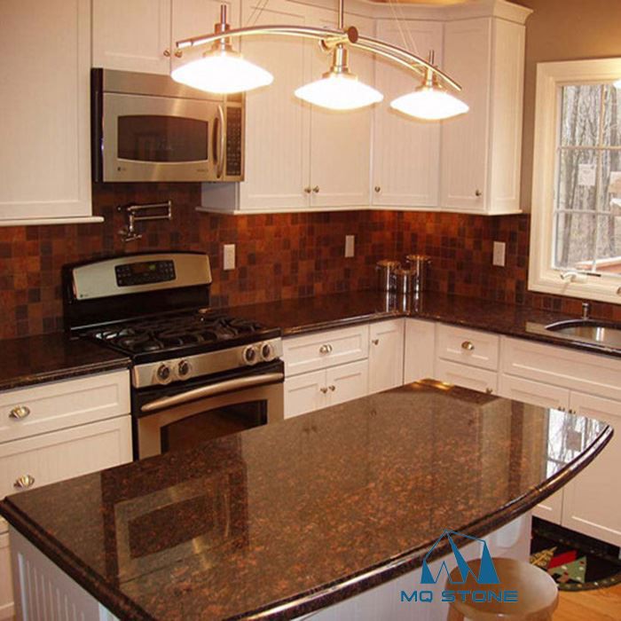 tan brown quartz countertop with white cablinets