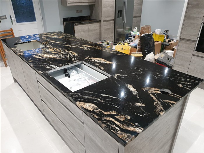 black and gold one hole granite worktops
