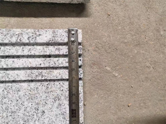 Wisconsin White Granite tiles groove